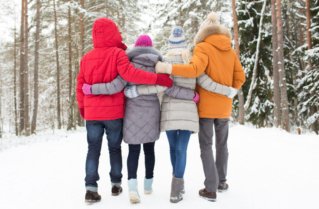 2 couples walking in snow