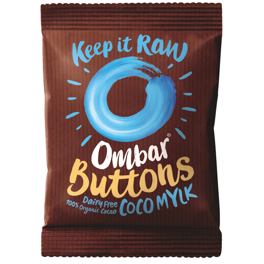 Close up of packet of Ombar dairy free choc buttons, compostable packaging