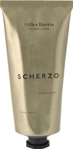 Pale gold tube, black lid and lettering Scherzo hand cream
