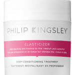 Philip Kingsley Elasticiser hair product, small wide jar with white lid and magenta stripe on label