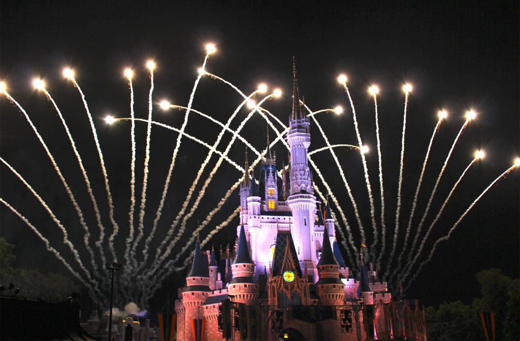 fireworks over Disney castle in Florida, night time