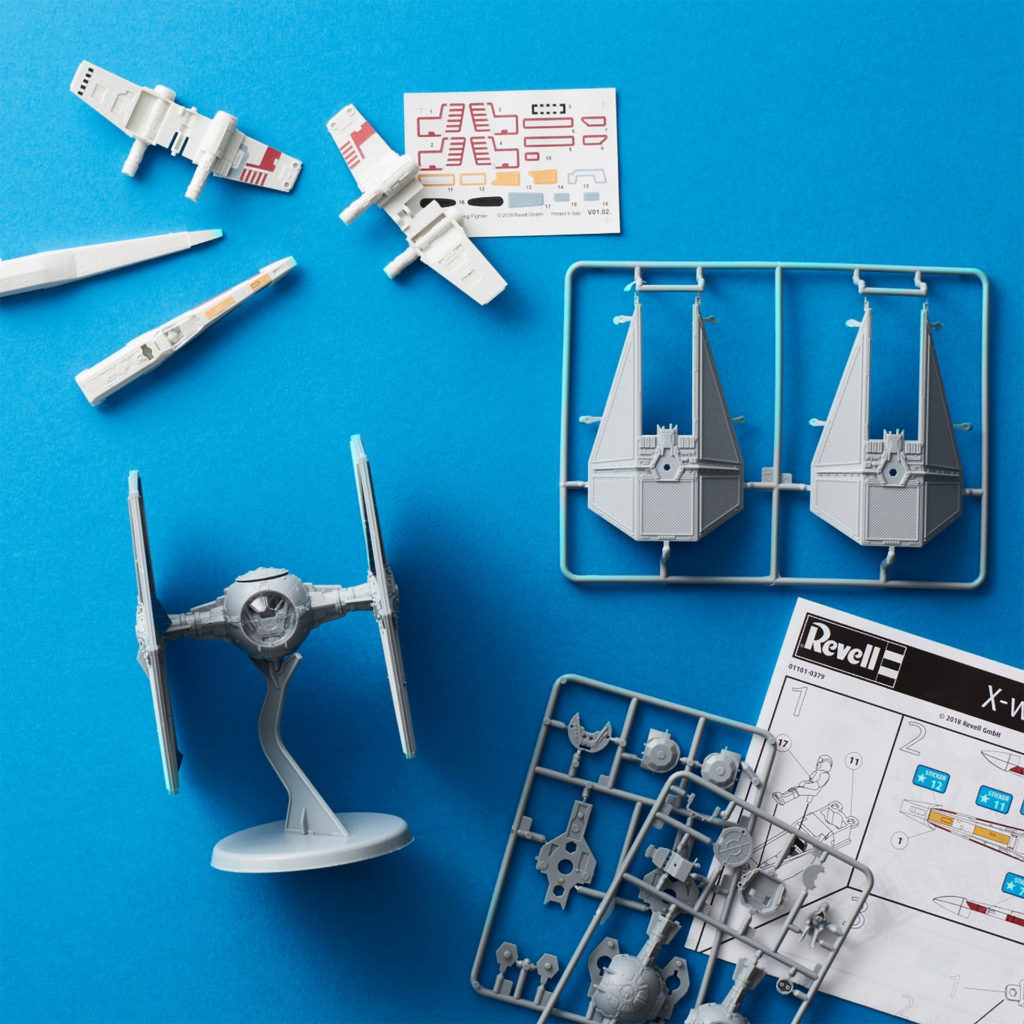 Parts of spaceship model kit and instructions