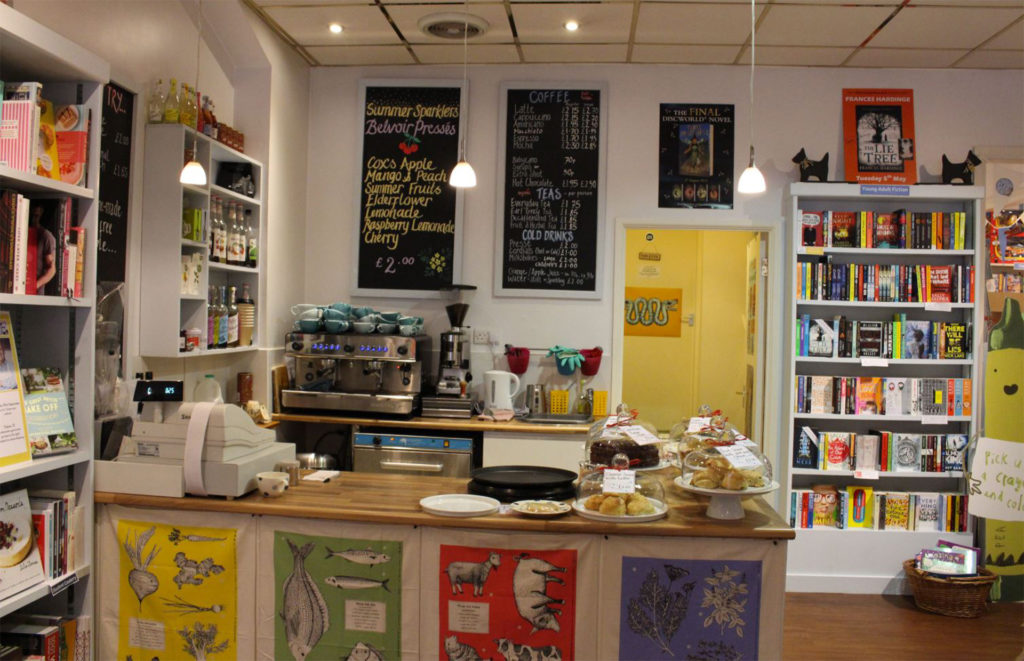 Cafe counter in bookshop, selling smoothies and cakes