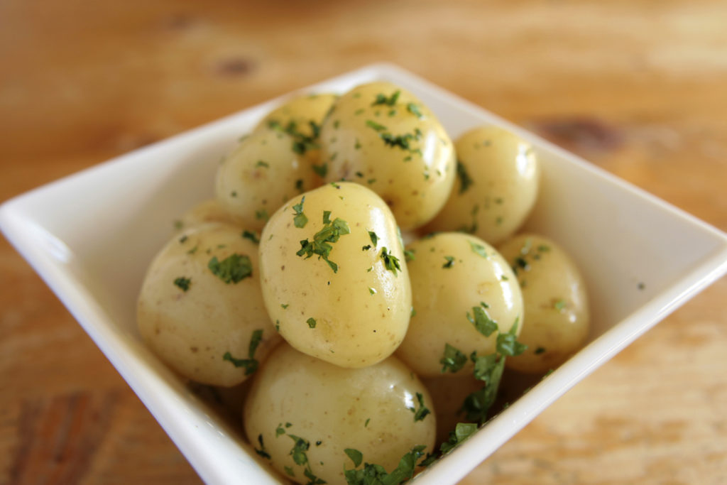 Cooked new potatoes with herbs