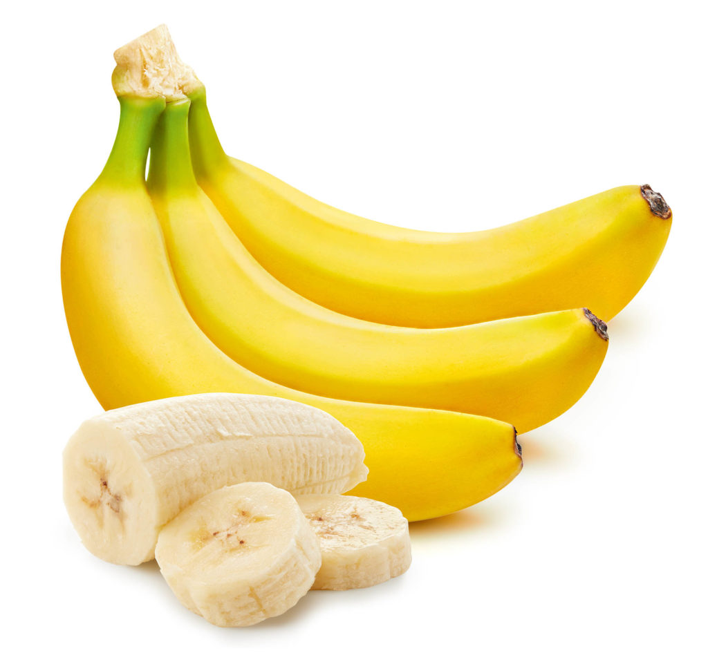 Bunch of bananas and slices isolated on white 