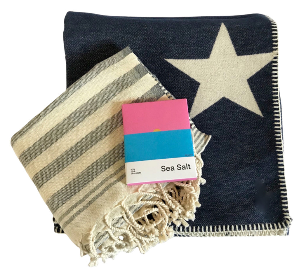 Gift set of blanket with star, towel and chocolate bar, eco gift